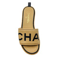Load image into Gallery viewer, Chanel Tan / Black Logo Leather and Cork Slide Sandals