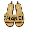 Load image into Gallery viewer, Chanel Tan / Black Logo Leather and Cork Slide Sandals