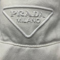 Load image into Gallery viewer, Prada White Triangle Logo Embroidered Wide Brimmed Cotton Drill Bucket Hat with Fringe