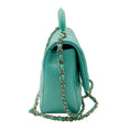 Load image into Gallery viewer, Chanel 2024 Turquoise / Gold Hardware Quilted Lambskin Leather Coco Trip Top Handle Flap Bag