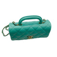 Load image into Gallery viewer, Chanel 2024 Turquoise / Gold Hardware Quilted Lambskin Leather Coco Trip Top Handle Flap Bag