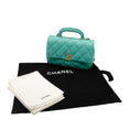 Load image into Gallery viewer, Chanel 2024 Turquoise / Gold Hardware Quilted Lambskin Leather Coco Trip Top Handle Flap Bag