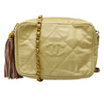 Load image into Gallery viewer, Chanel Vintage Beige CC Logo Quilted Embossed Leather Crossbody Bag with Chain Strap and Tassel Detail
