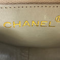 Load image into Gallery viewer, Chanel Vintage Beige CC Logo Quilted Embossed Leather Crossbody Bag with Chain Strap and Tassel Detail
