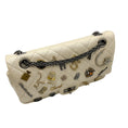 Load image into Gallery viewer, Chanel Ivory Metallic Quilted Aged Calfskin Leather Limited Edition Lucky Charms 2.55 Reissue Flap Bag