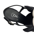 Load image into Gallery viewer, Chanel Black 2023 Crumpled Shiny Fabric Grosgrain Cap Toe Camellia Bow Slingback Pumps