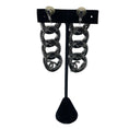 Load image into Gallery viewer, Chanel 2022 Ruthenium Crystal Embellished Interlocking CC Logo Clip On Drop Earrings