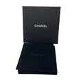 Load image into Gallery viewer, Chanel 2022 Ruthenium Crystal Embellished Interlocking CC Logo Clip On Drop Earrings