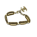 Load image into Gallery viewer, Chanel 2018 Light Gold CC Logo Pendant Charm Strass Embellished Bracelet