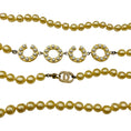 Load image into Gallery viewer, Chanel Vintage 2001 Cream Coco CC Logo Pearl Long Strand Necklace with Gold-tone Hardware