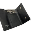 Load image into Gallery viewer, Chanel 2010 Black / Silver CC Logo Camellia Embossed Leather 6 Key Holder Wallet