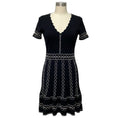Load image into Gallery viewer, Alexander McQueen Black / White Stitched Short Sleeved Flared Knit Dress with Cut Out Detail

