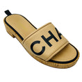 Load image into Gallery viewer, Chanel Tan / Black Logo Leather and Cork Slide Sandals
