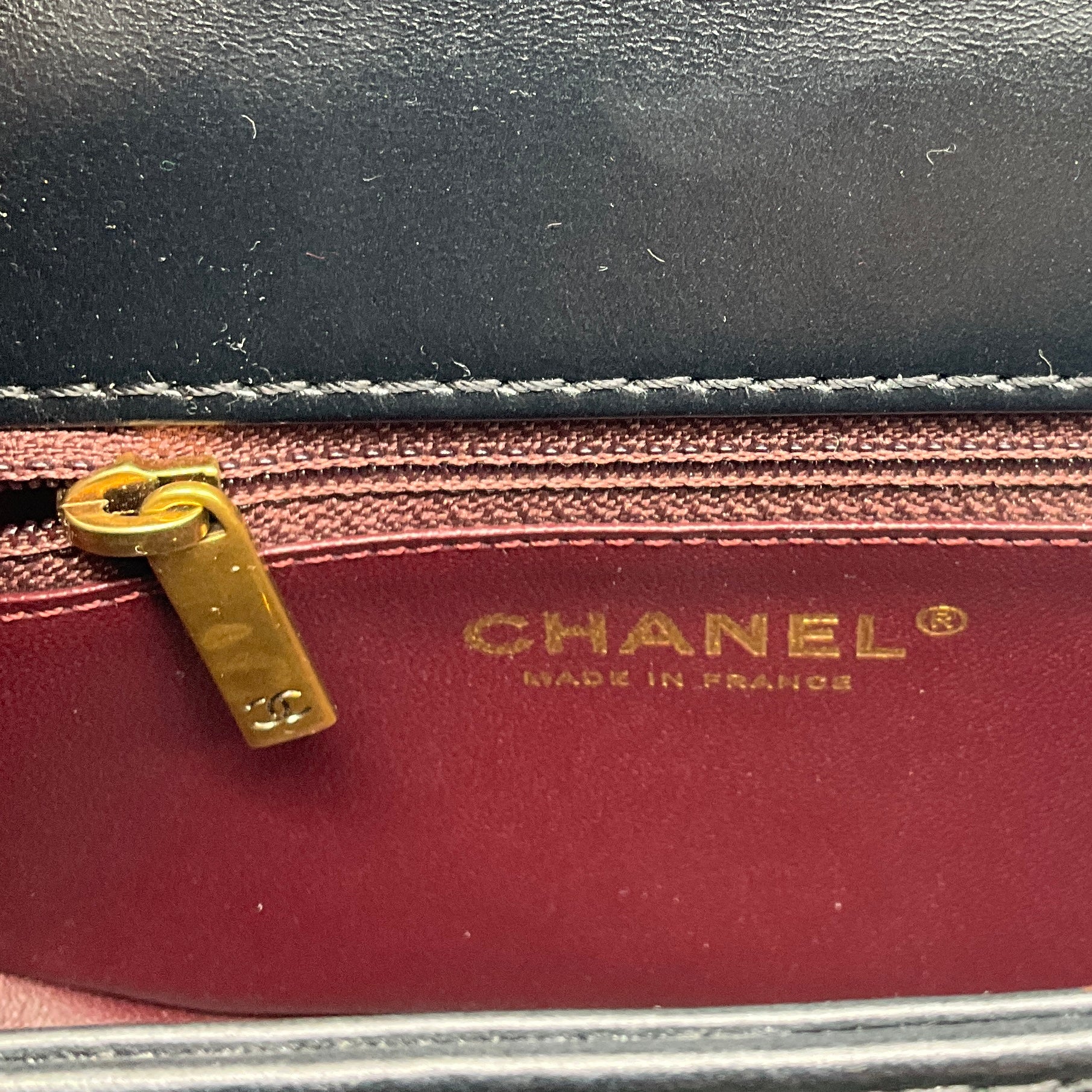 Chanel Black / Burgundy Trimmed Quilted Leather Single Flap Handbag with Aged Gold Hardware
