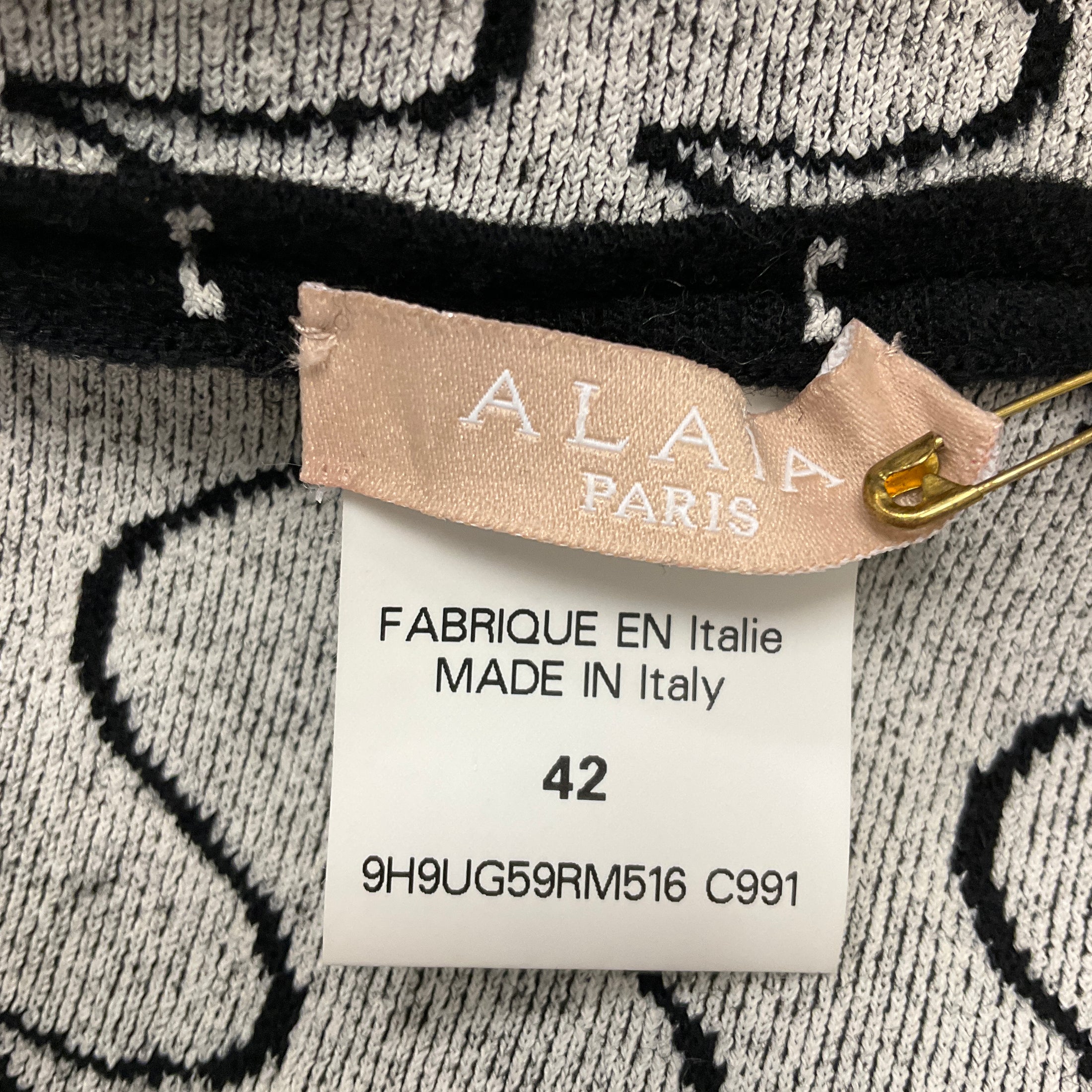 Alaia Black / White Flared Long Sleeved Stretch Knit Top