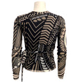 Load image into Gallery viewer, Fuzzi Black / Tan Print Long Sleeved Wrap Top
