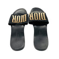 Load image into Gallery viewer, Christian Dior Black / Gold Revolution Logo Leather Flat Slide Sandals
