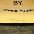 Load image into Gallery viewer, BY. Bonnie Young Black Ruffled Oversized Zip Front Nylon Coat
