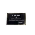Load image into Gallery viewer, Chanel Black / Cream Camellia and Pearl Embellished Lucite Clutch Bag with Chain Strap
