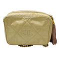 Load image into Gallery viewer, Chanel Vintage Beige CC Logo Quilted Embossed Leather Crossbody Bag with Chain Strap and Tassel Detail
