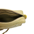 Load image into Gallery viewer, Chanel Vintage Beige CC Logo Quilted Embossed Leather Crossbody Bag with Chain Strap and Tassel Detail
