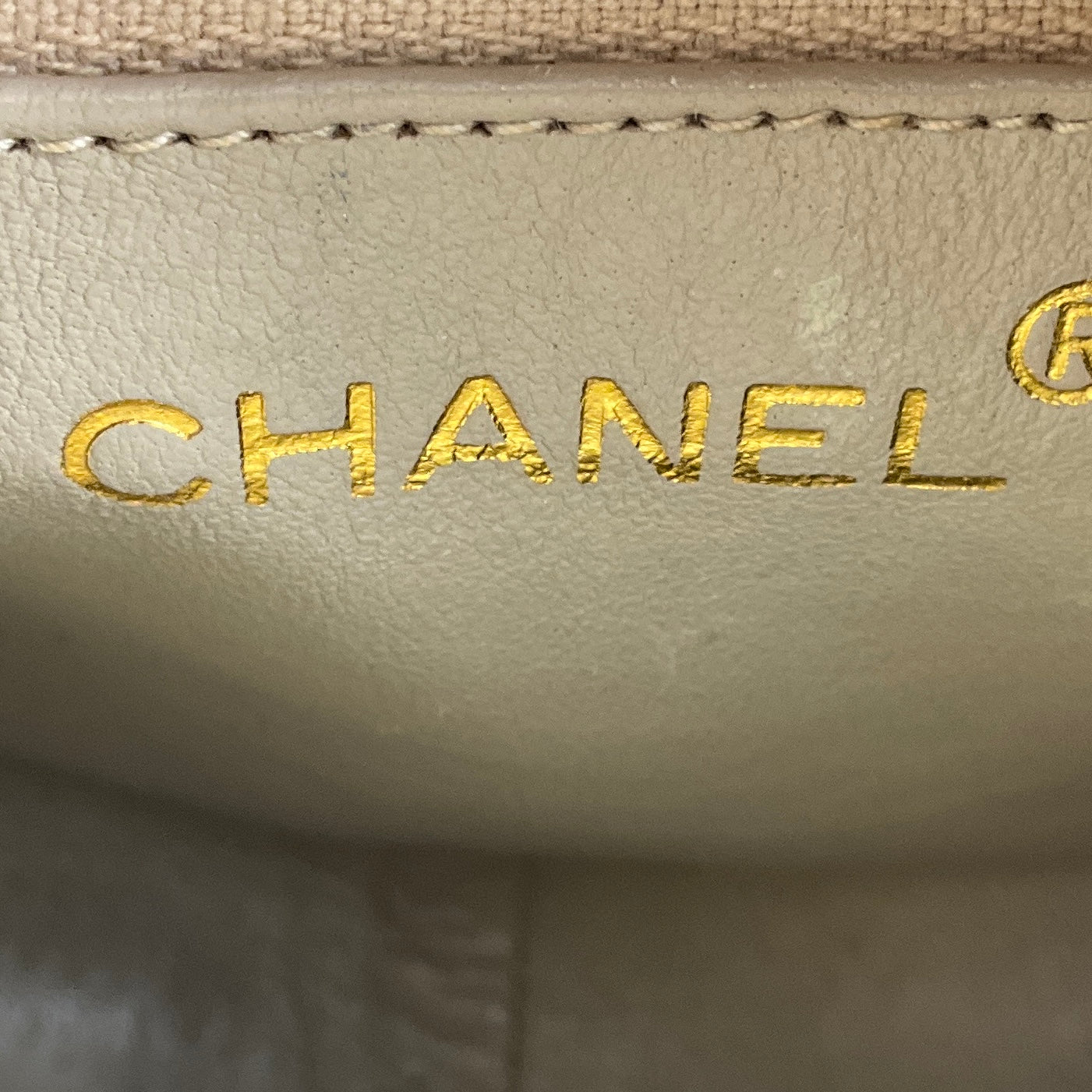 Chanel Vintage Beige CC Logo Quilted Embossed Leather Crossbody Bag with Chain Strap and Tassel Detail