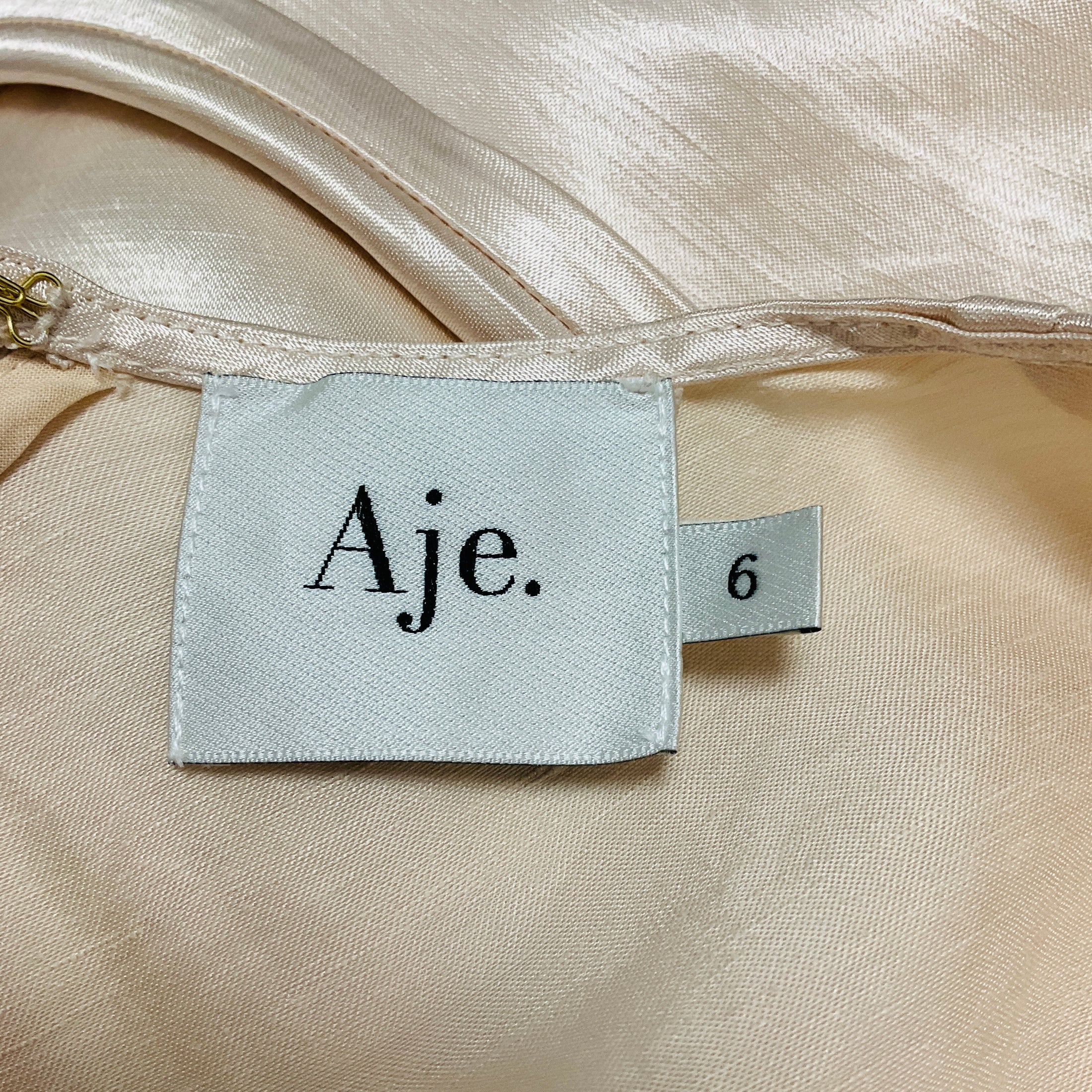 Aje Beige Moonglade Piercing Top