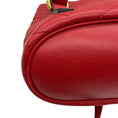 Load image into Gallery viewer, Gucci Red GG Marmont Leather Drawstring Mini Backpack
