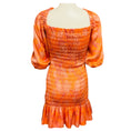 Load image into Gallery viewer, Alexis Orange Lipari Smocked Floral Mini Dress

