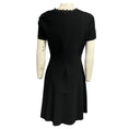 Load image into Gallery viewer, Valentino Black Cut Out Neck Short Sleeved Flared Knit Dress
