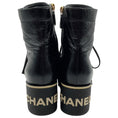 Load image into Gallery viewer, Chanel Black Crinkled Patent Leather Lace Up Combat Boots
