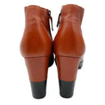 Load image into Gallery viewer, Hermes Brown / Black Two-Tone Round Toe Leather Ankle Booties
