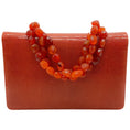 Load image into Gallery viewer, Darby Scott Orange Lizard Necklace Bag
