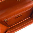 Load image into Gallery viewer, Darby Scott Orange Lizard Necklace Bag
