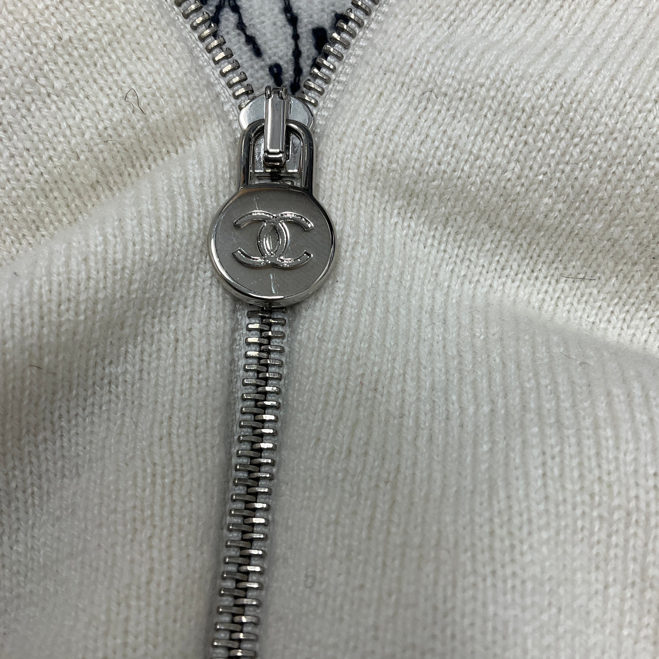 Chanel Ecru Zip Up Cashmere Knit Cardigan with Lion Head and CC Logo Embroidery