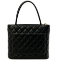 Load image into Gallery viewer, Chanel Black Quilted Caviar Medallion Tote
