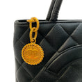 Load image into Gallery viewer, Chanel Black Quilted Caviar Medallion Tote
