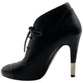 Load image into Gallery viewer, Chanel Black Leather Lace Up Ankle Boots with Silver Heel Detail
