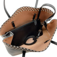 Load image into Gallery viewer, Alaïa Black Leather Eyelet Embellished Tote
