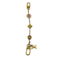 Load image into Gallery viewer, Louis Vuitton Gold Multi Mirage Chain Bag Charm
