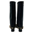 Load image into Gallery viewer, Chanel Black CC Logo Embroidered Tall Leather Boots with Grosgrain Cap Toe and Gold Chain Detail
