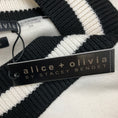 Load image into Gallery viewer, Alice + Olivia Ecru / Black Long Sleeved V-Neck Wool Knit Sweater
