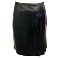 Load image into Gallery viewer, Chanel Vintage 2001 Dark Navy Blue Silk Lined Lambskin Leather Skirt with Logo Plate and Pleated Detail
