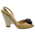 Load image into Gallery viewer, Chanel Beige Peep Toe Wedges With Black Camellia
