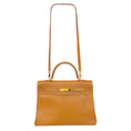 Load image into Gallery viewer, Hermès Kelly 35 Clemence Tan Leather Satchel
