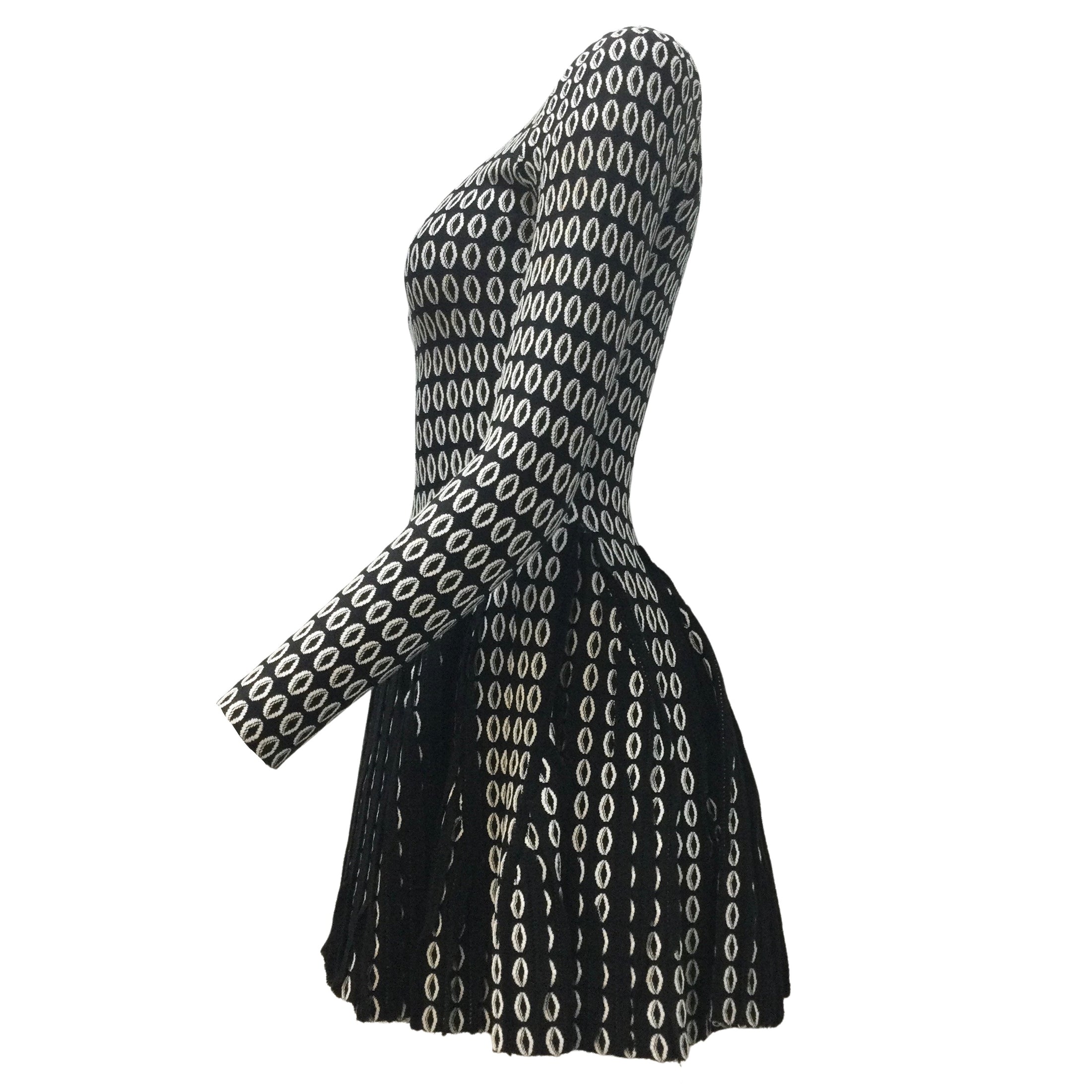 ALAÏA Black / White Printed Long Sleeved Knit Fitted Flared Pleated Mini Cocktail Dress