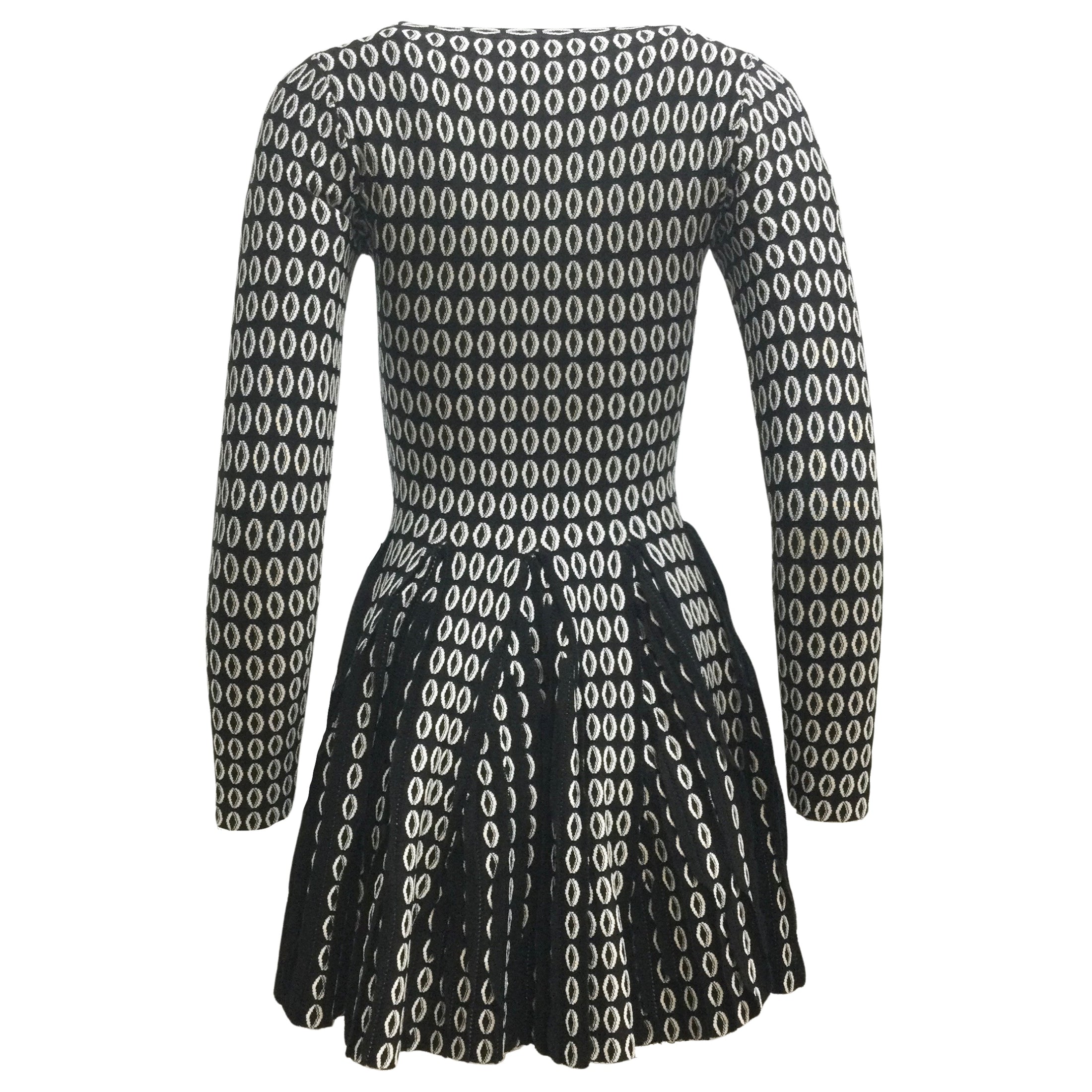 ALAÏA Black / White Printed Long Sleeved Knit Fitted Flared Pleated Mini Cocktail Dress